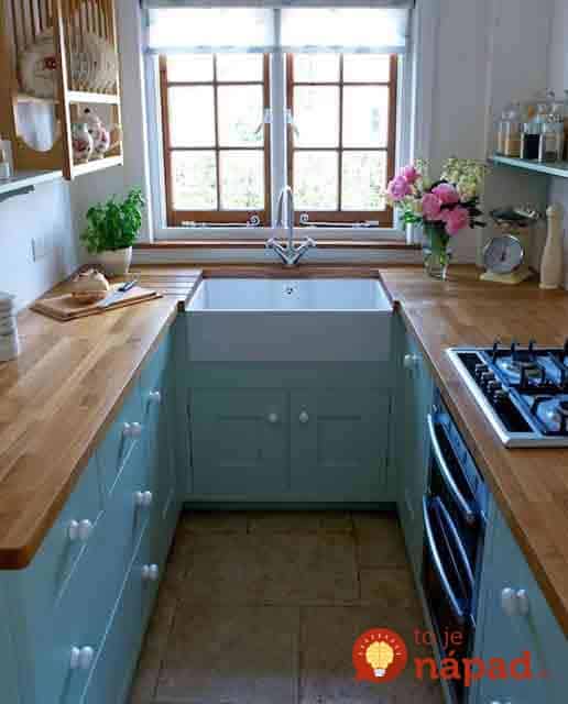 built-in-a-properly-designed-small-kitchen-with-minimal-clutter-and-max-efficiency-with-blue-pantry-and-drawer-and-undressed-window
